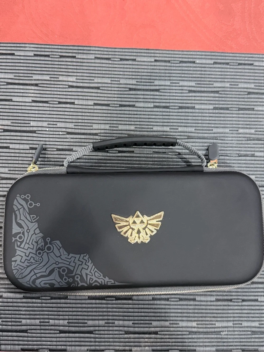 Black Travel Case with Gold Emblem